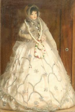 Doll, whose dress was made by mom...